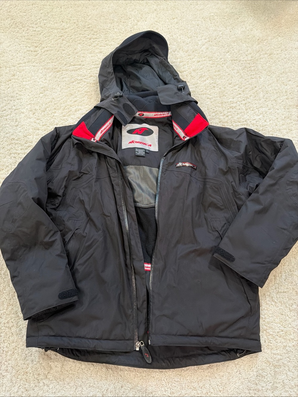 Nordica Black Ski Jacket with Red Logo Trim